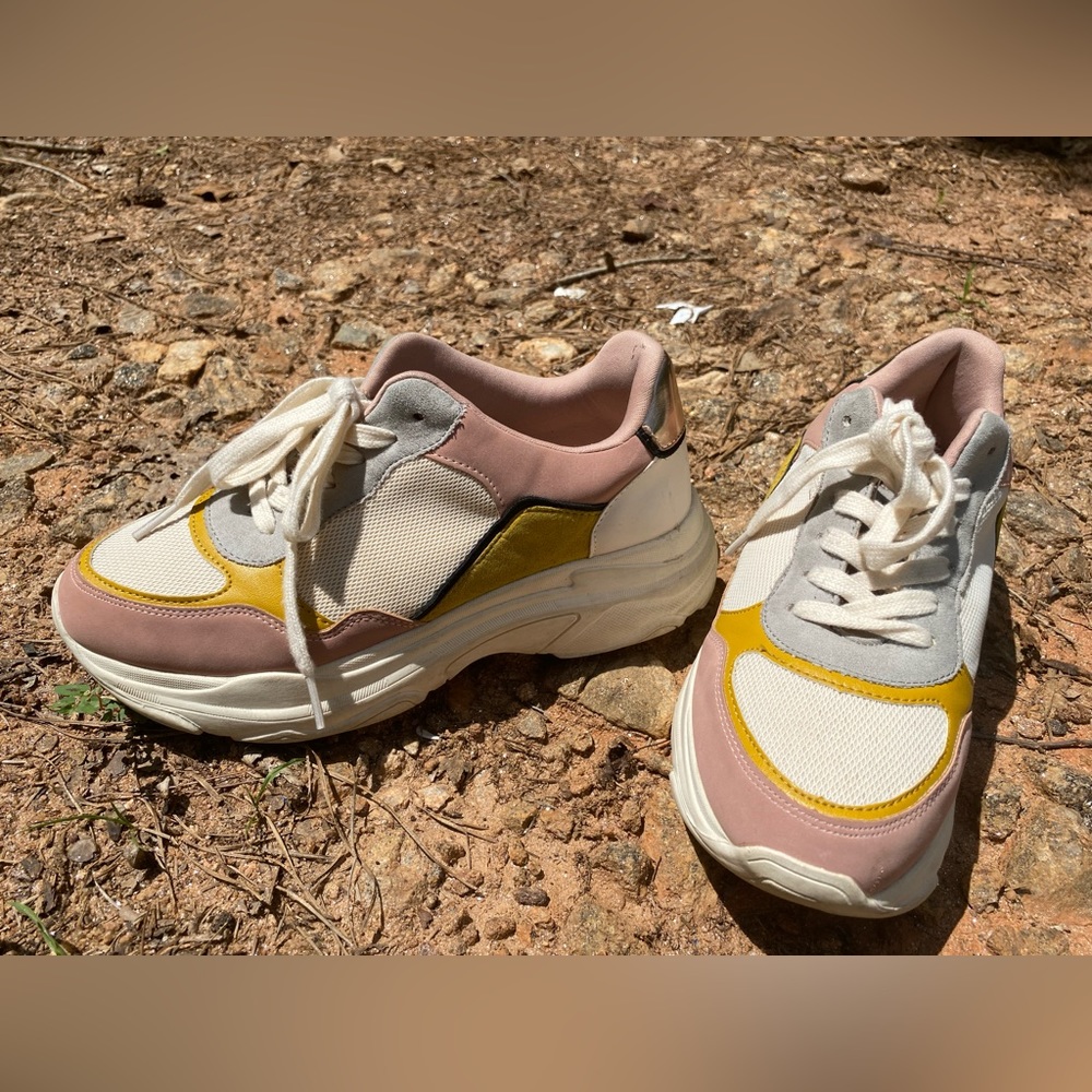 White pink blue and yellow sneakers